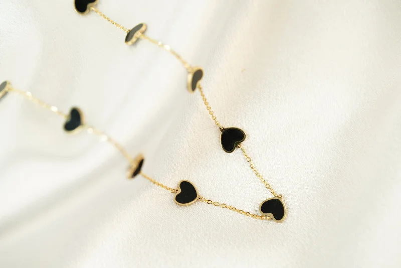 ladies-fashion-pearl-necklace-14k Black Hearts Necklace